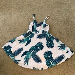 Pink cream tropical dress with green leaves